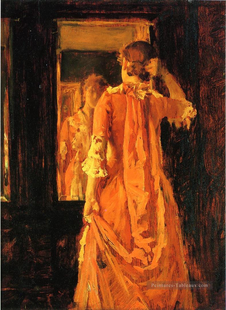 Jeune femme devant un miroir William Merritt Chase Peintures à l'huile